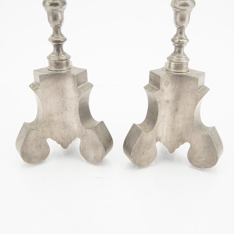 Firma Svenskt Tenn,  a pair of 1928 pewter candle sticks.