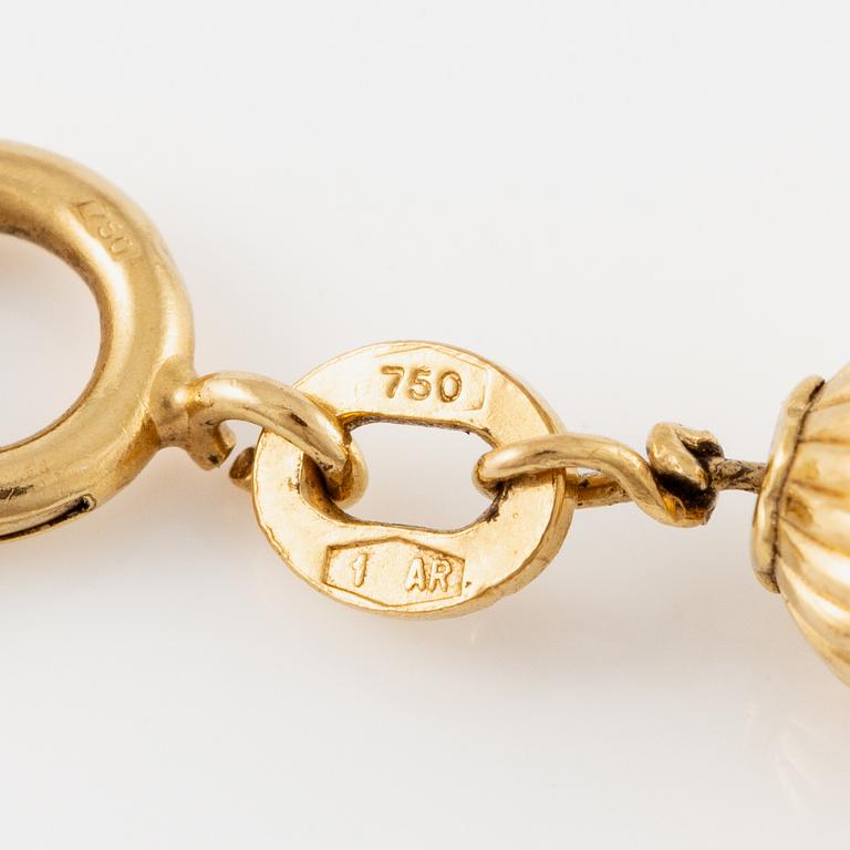 Bracelet, 18K gold with turquoises.