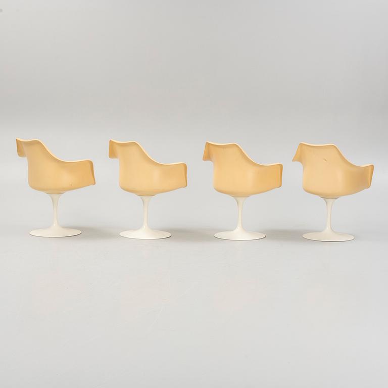 Eero Saarinen, four "Tulip" chairs, Knoll International, and a table.