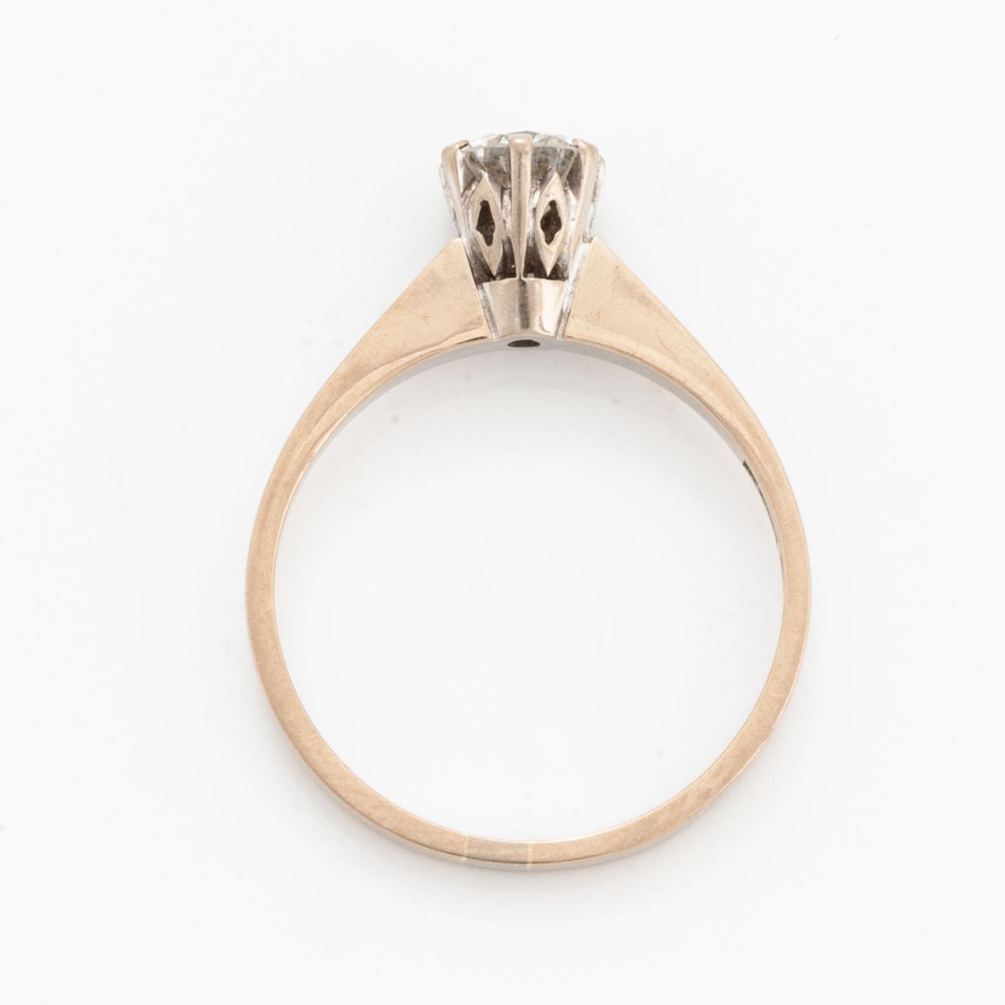 Brilliant-cut diamond solitaire ring.