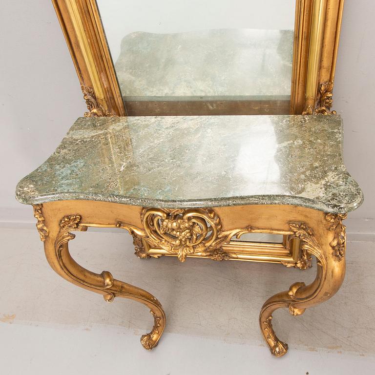 A bronzed Neo Rovovo mirror and table later part of the 19th century.