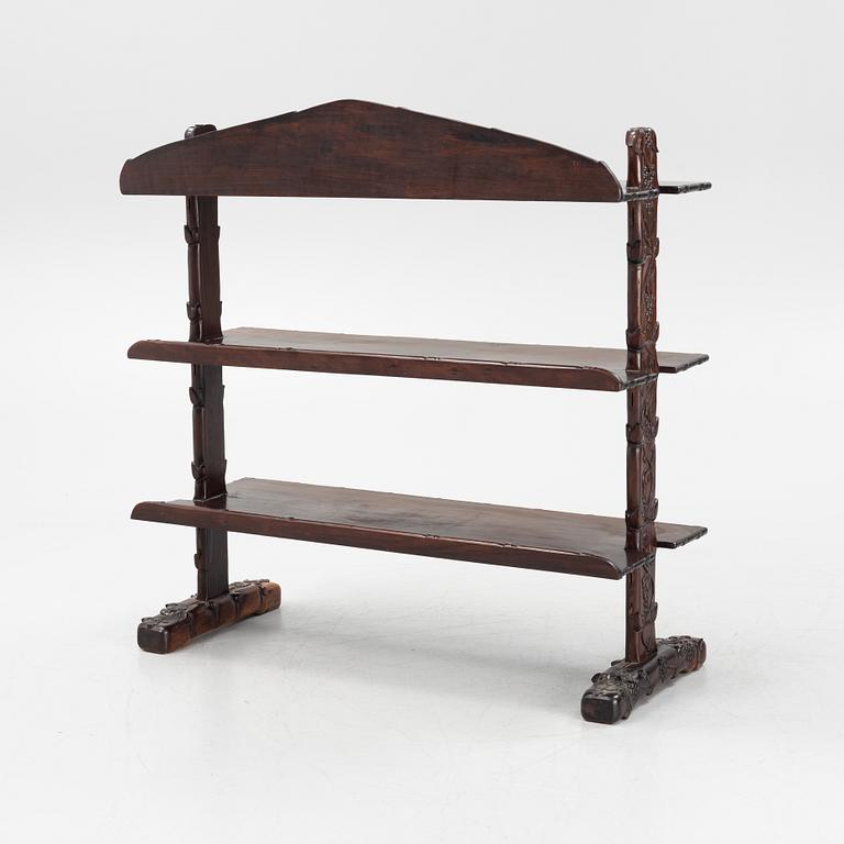 A Chinese hardwood shelf, 20th century.