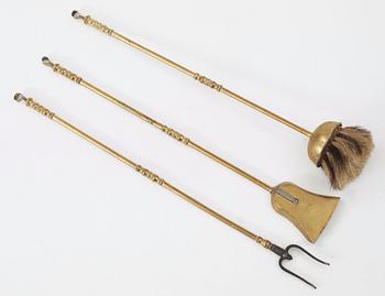A set of fireplace brass utensils, 18th century.