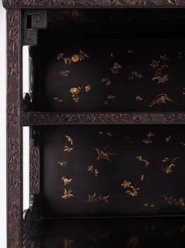 A lacquer display cabinet, late 19th Century.