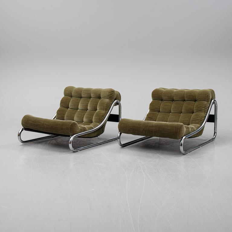 A pair of 'Impala' lounge chairs with table by Gillis Lundgren for IKEA, released 1972.