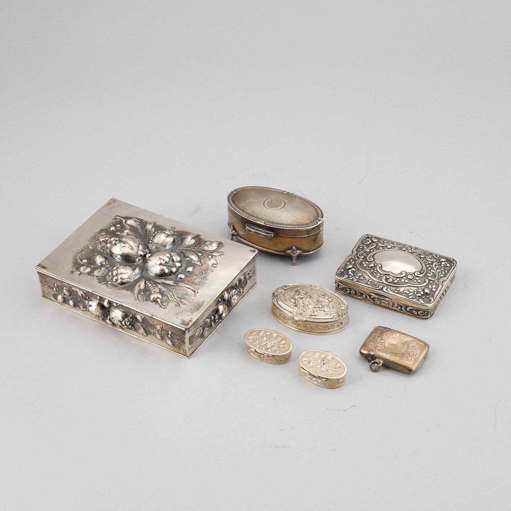 7 silver boxes.