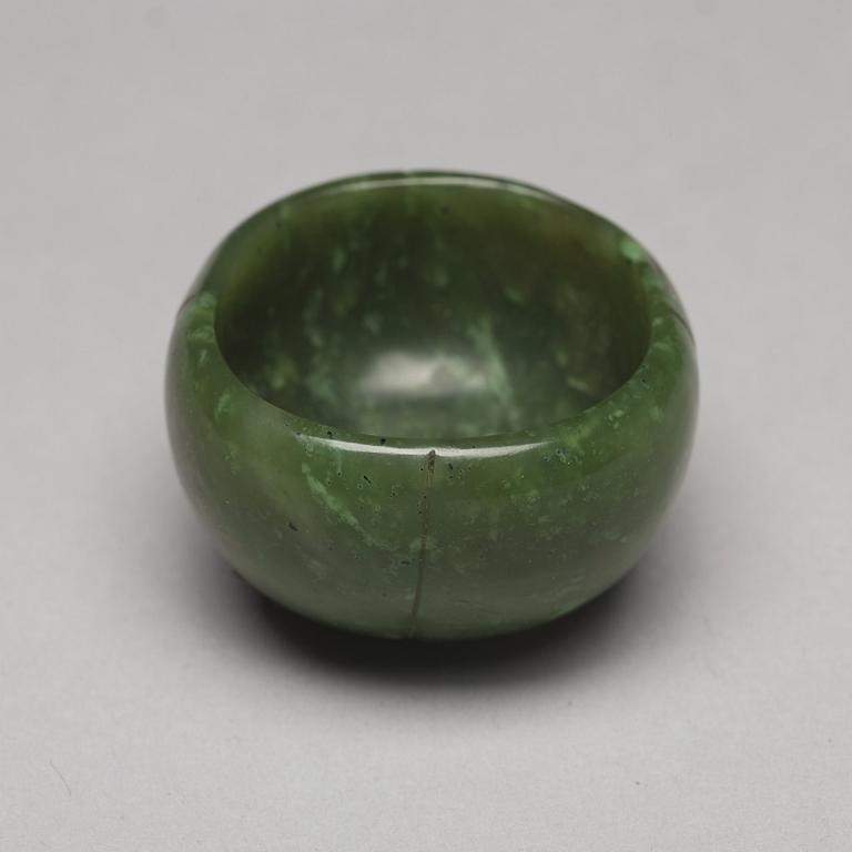 A group of four nephrite objects, Qing dynasty or older.