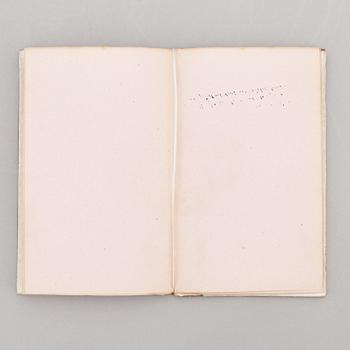 A keepsake book embellished by Ellen Jolin featuring a 'Santa Claus' figure.