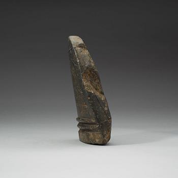 A carved Tibetan votive placque.