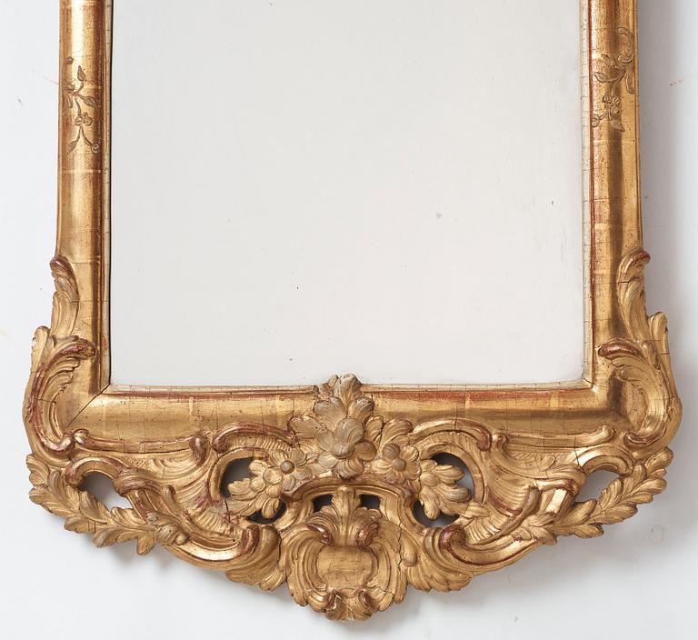 A Swedish Rococo mirror by Nils Sundström (master in Stockholm from 1757), dated 1770.