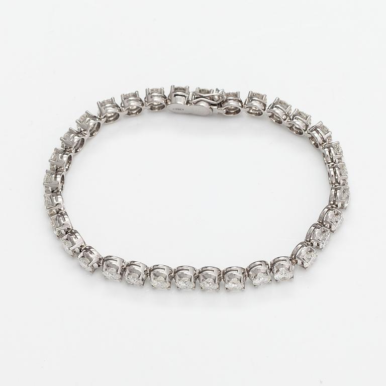 Tennisrannekoru, 18K valkokultaa ja briljanttihiottuja timantteja n. 7.50 ct yht.