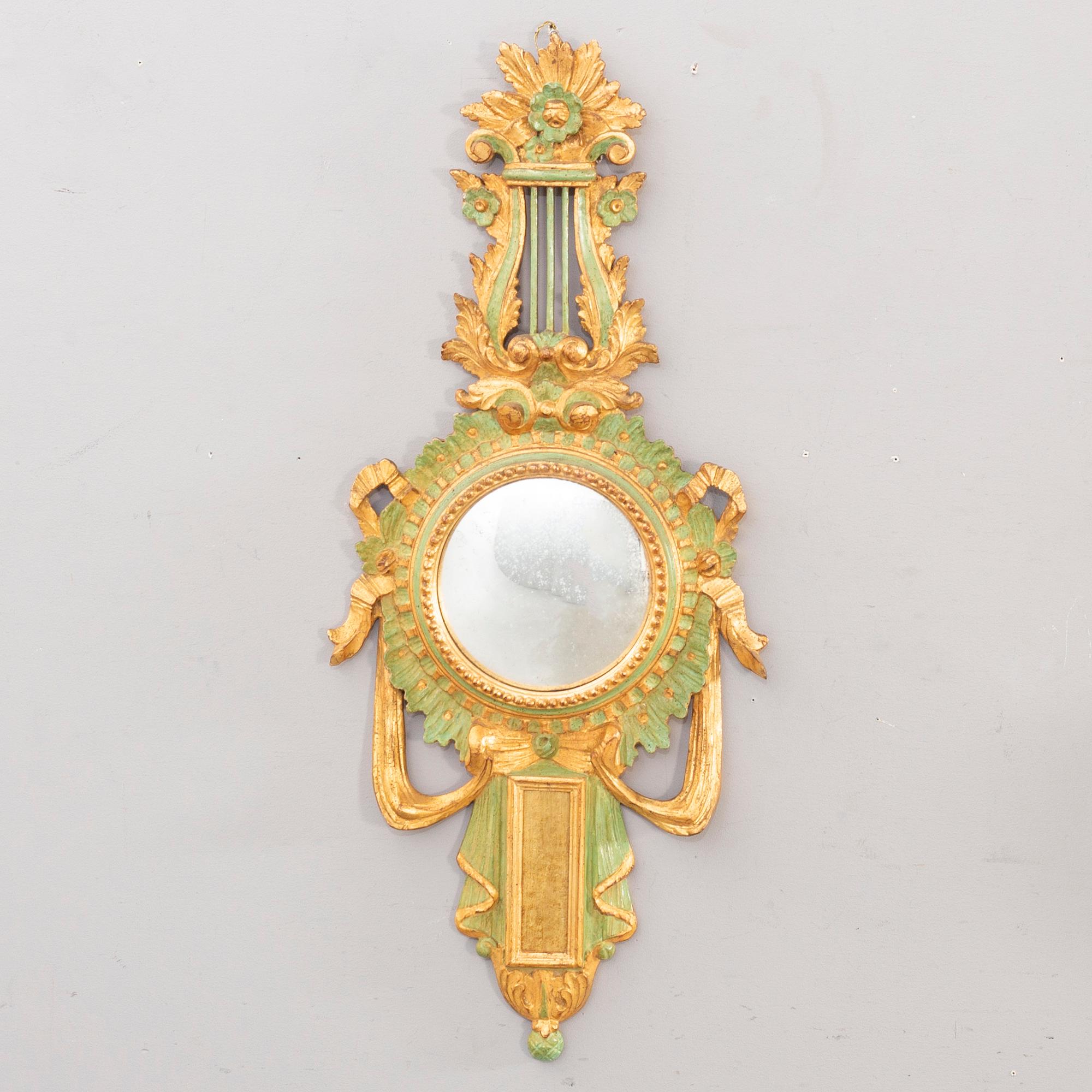 An md 20th century wood mirror from Paoletti, Firenze Italy.