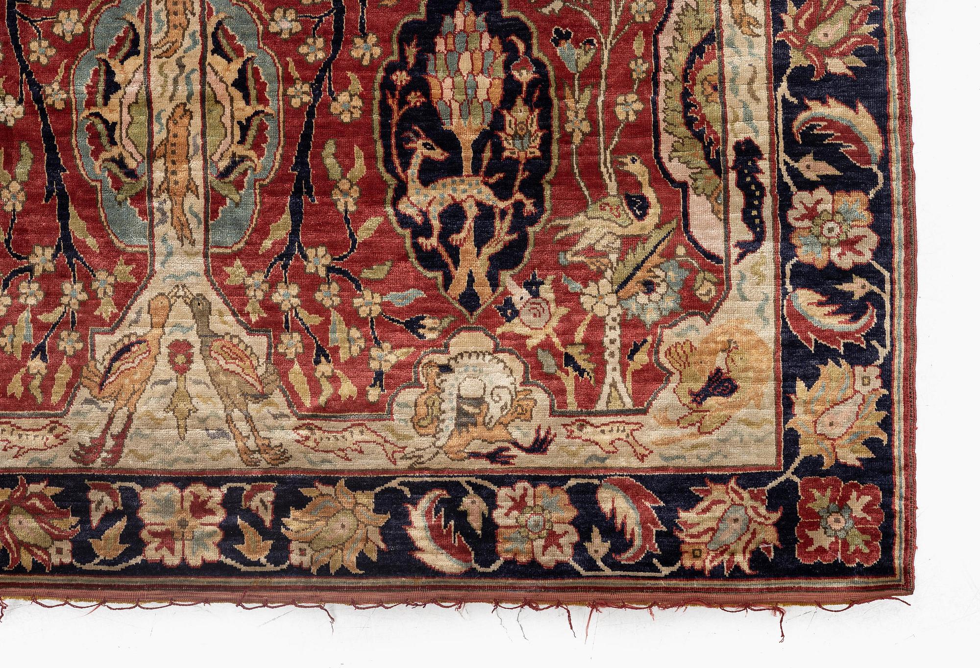 An antique Anatolian silk rug, c. 183 x 120 cm.