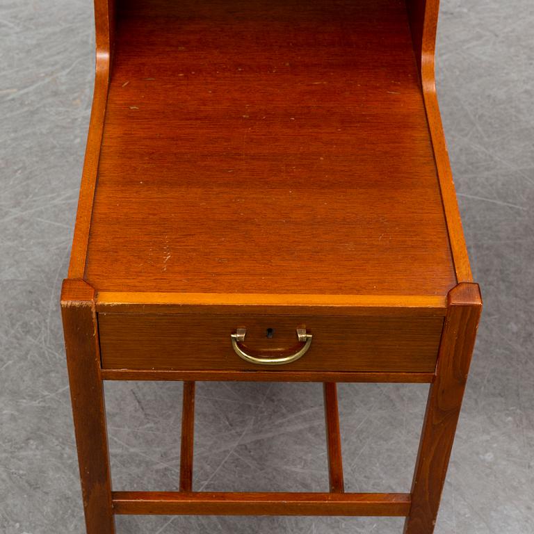 A pair of late 20th Century bedside tables.