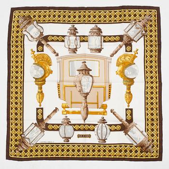 An Hermès "Feux de Route" silk scarf.