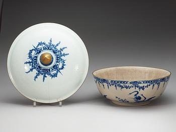 A massive blue and white armorial punch bowl with cover with the arms of Grill, Qing dynasty, Qianlong (1736-95).