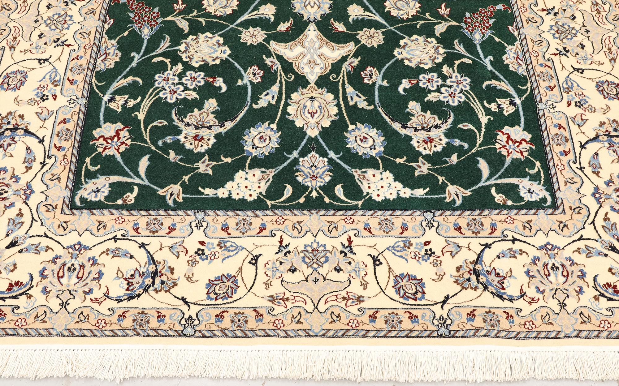 A part silk Nain rug, so-called 9LAA, approx. 257 x 161 cm.
