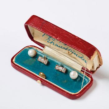 A pair of jewelled, pearl and gold Imperial presentation cufflinks by Constantine Nicholls Ewing, St Petersburg ,