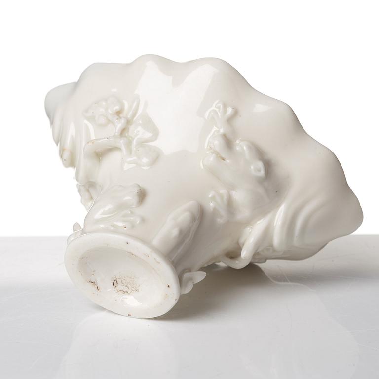 A blanc de chine rhinoserous libation cup, Qing dynasty, Kangxi (1662-1722).