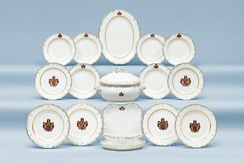 1418. A Berlin armorial dinner service, 19th Century. (15 pieces).