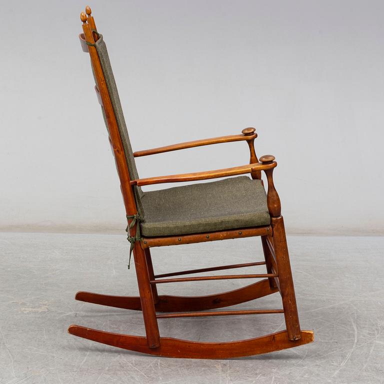 An early 20th century rocking chair.