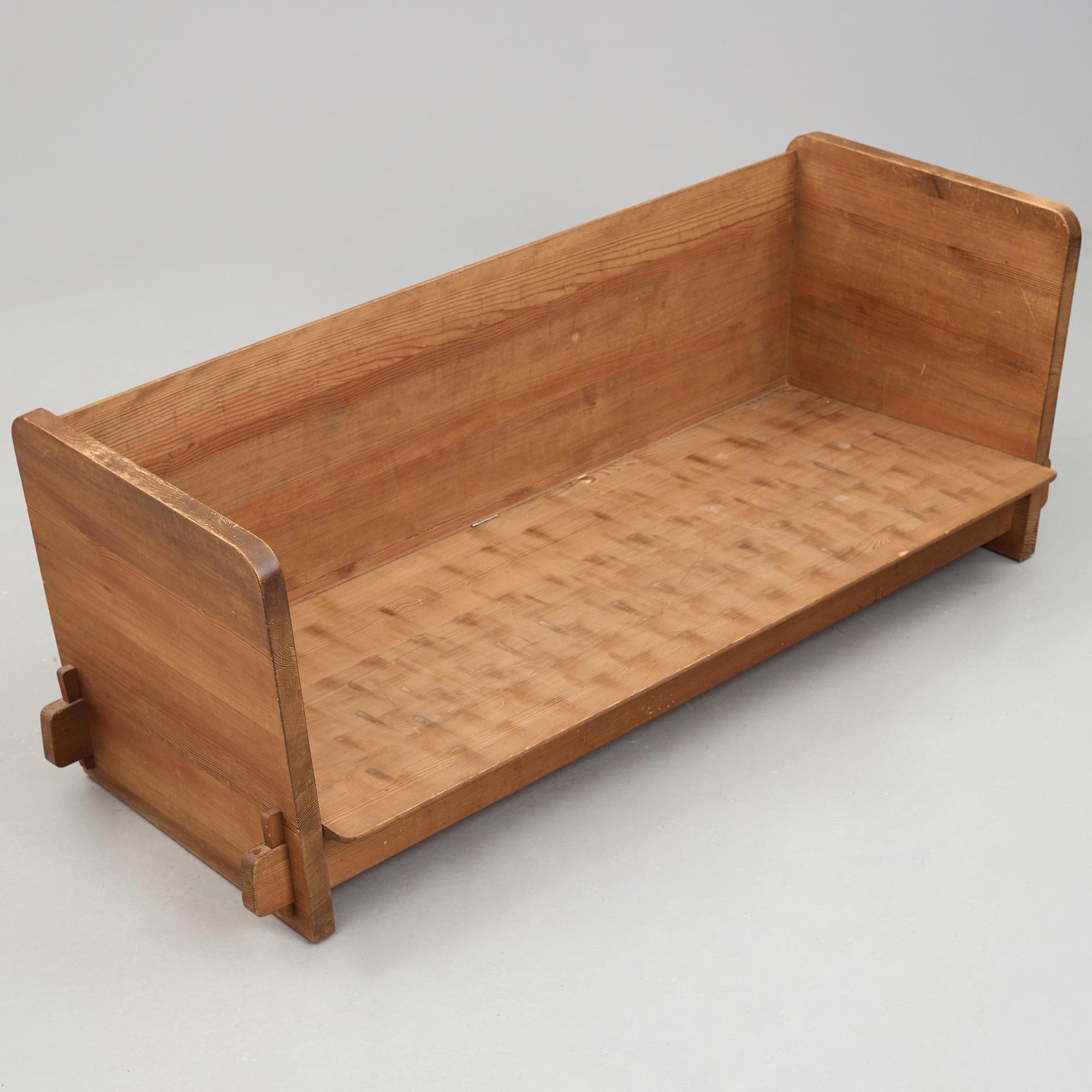 Axel Einar Hjorth, a stained pine "Lovö" sofa, Nordiska Kompaniet, Sweden 1930's.