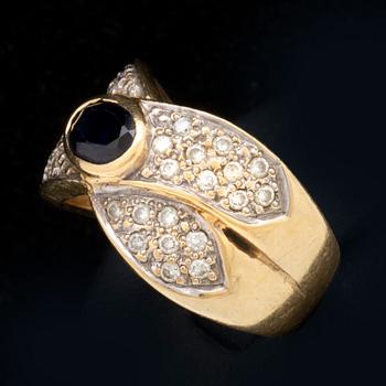 Ring 18K gold 1 sapphire apprx 7 x 4 mm and brilliant-cut diamonds approx 0,40 ct in total.