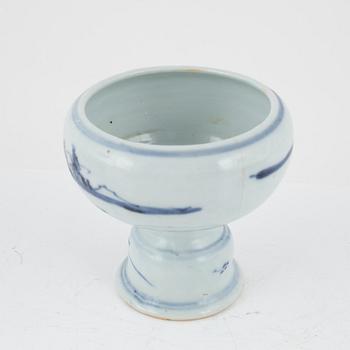A blue and white stemcup and two dishes, Qing dynasty, 18th Century.