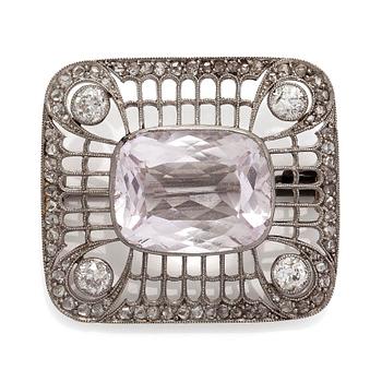 A platinum brooch with morganite and old cut diamonds.