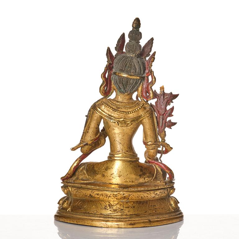 A Tibeto-Chinese/Mongolian gilt bronze figure of White Tara, 18th Century.