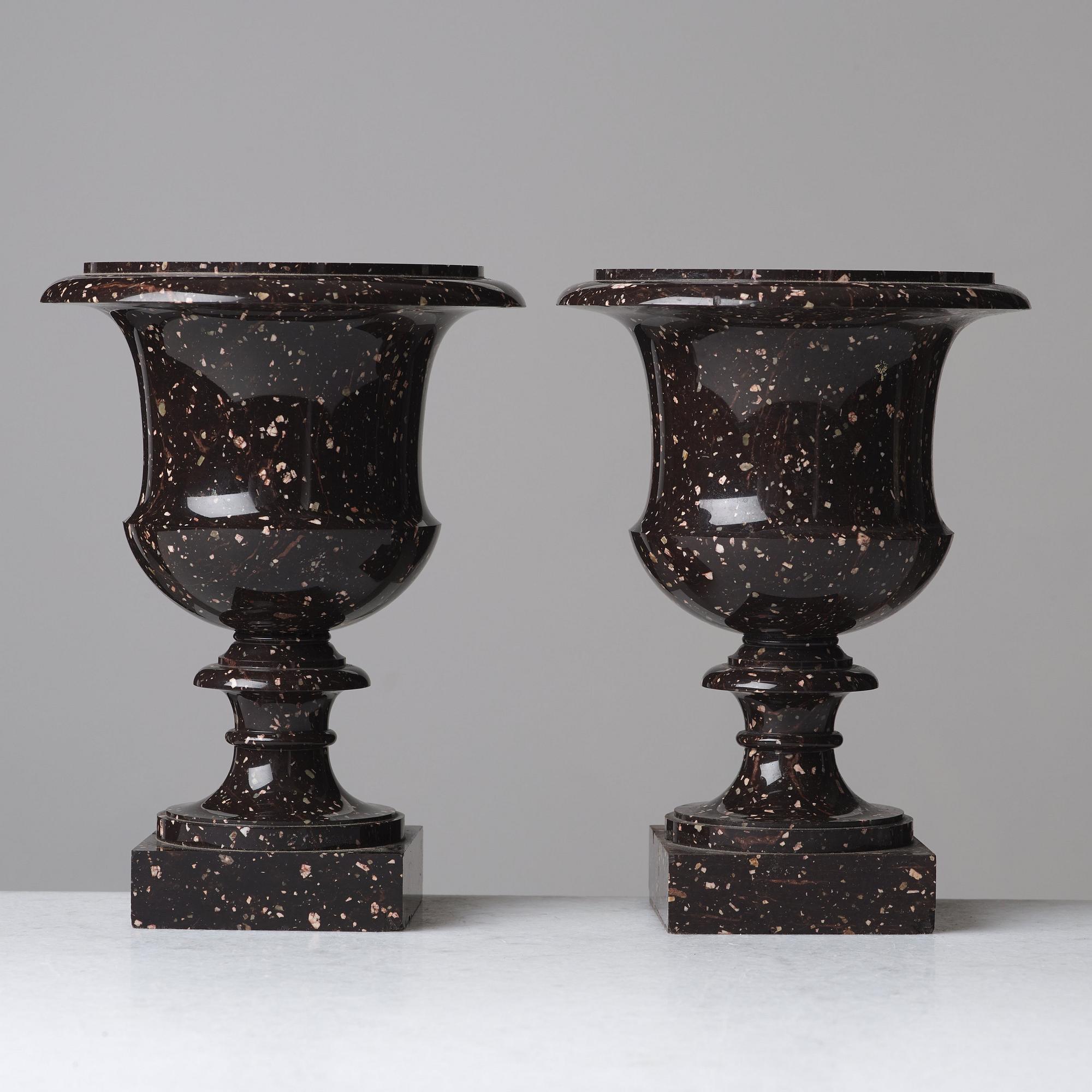 A pair if Swedish porphyry urns, early 19th century.