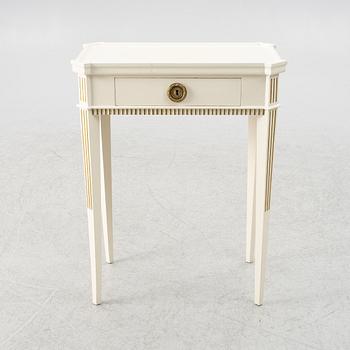 A Gustavian style side table, early 20th century.