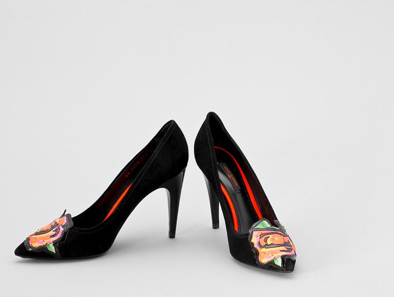 Two pair of shoes by Louis Vuitton.