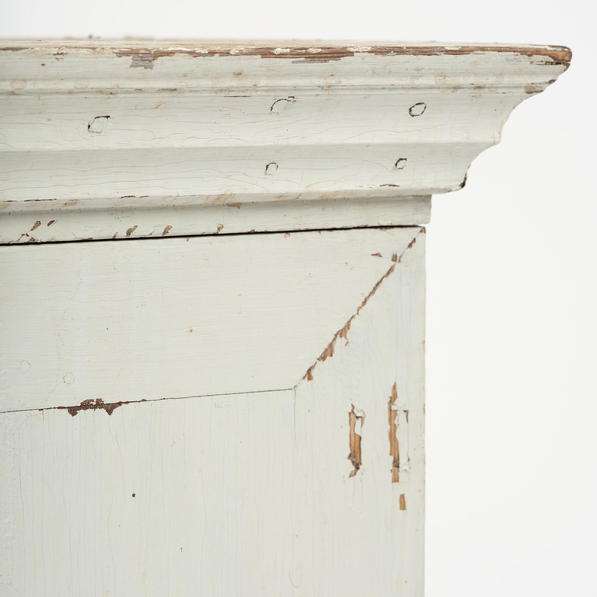 A Gustavian column-shaped cabinet, circa 1800.