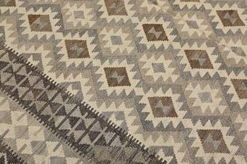 A Kilim rug, approx. 297 x 203 cm.