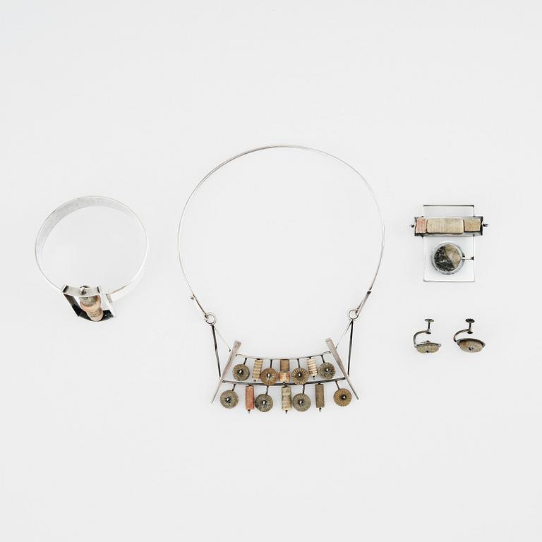 Inga-Britt "Ibe" Dahlquist, a sterling silver necklace, brooch (Olof Barve), earrings and a bangle executed in her own studio Malmö 1958-1959.