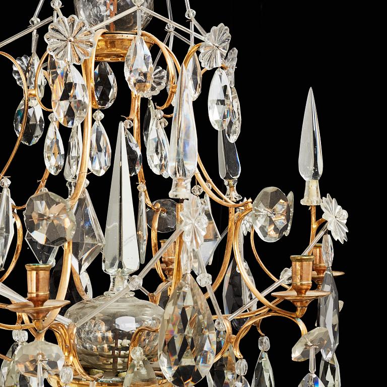 A pair of Swedish Rococo 18th century six-light chandeliers by Olof Westerberg dated 1789 and 1790.