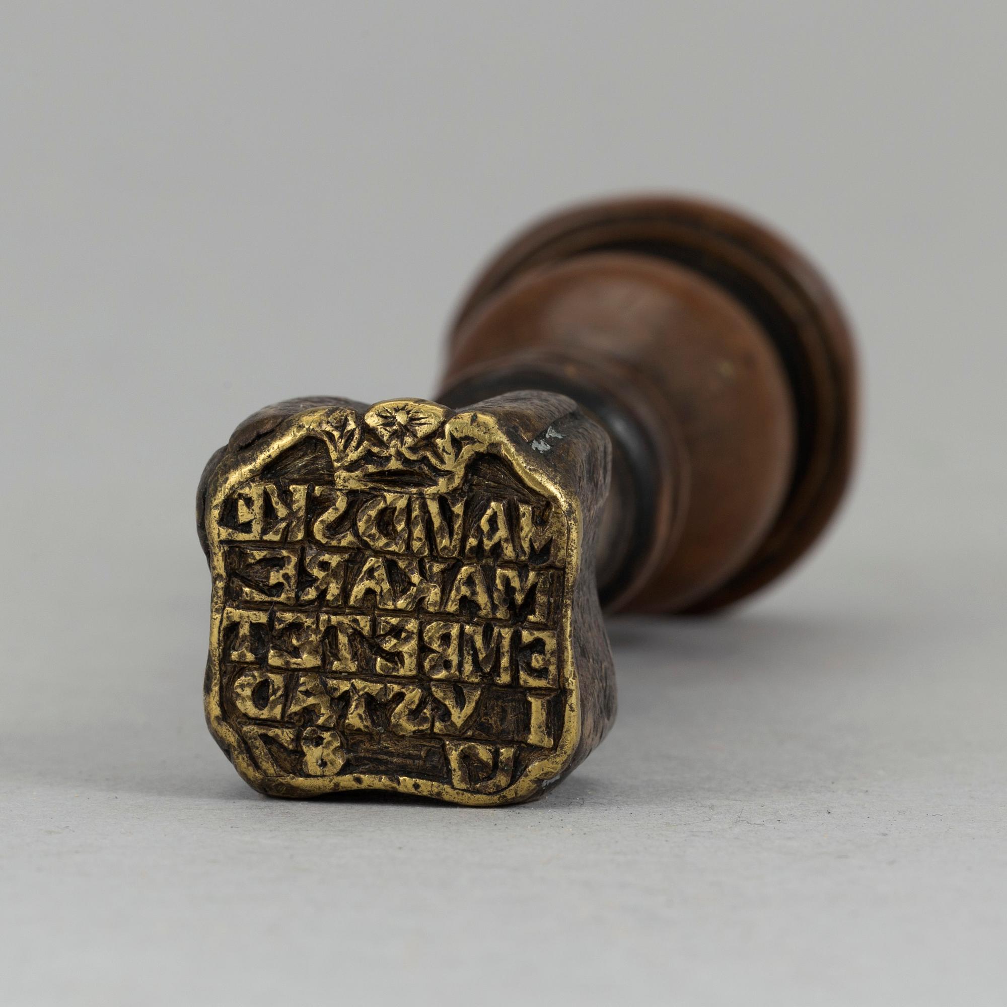 A 18th century glove makers seal.