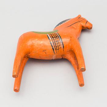 A painted folk art dala horse first half of the 20th century.