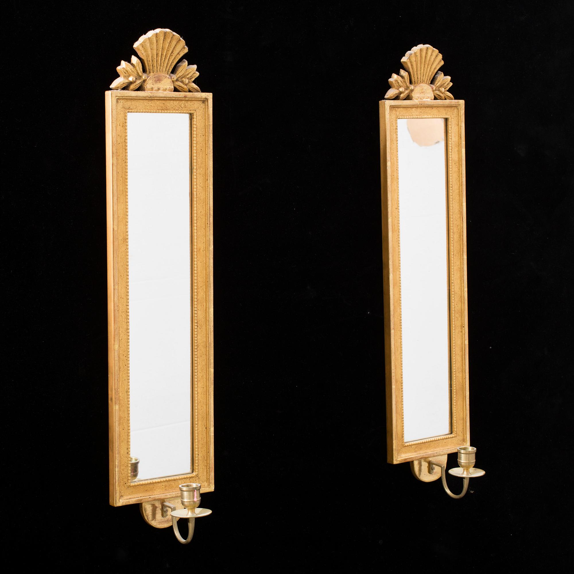 A pair of Swedish mid 20th century Gustavian style wall sconces from Kurt Ekvall in Nyköping.