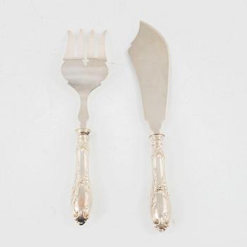 A silver carving knife and fork set, circa 1900.