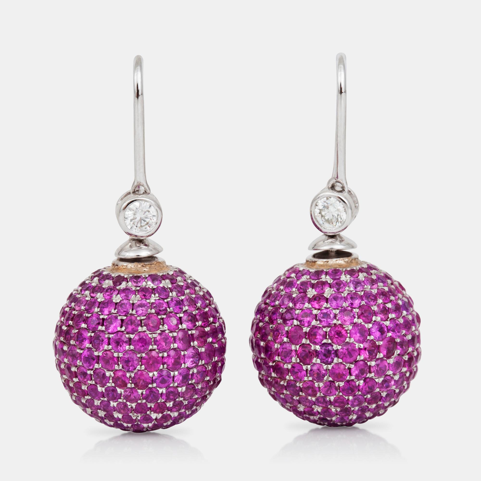 A pair of pink sapphire, diamond and cultured pearl earrings that can be worn in two different ways.