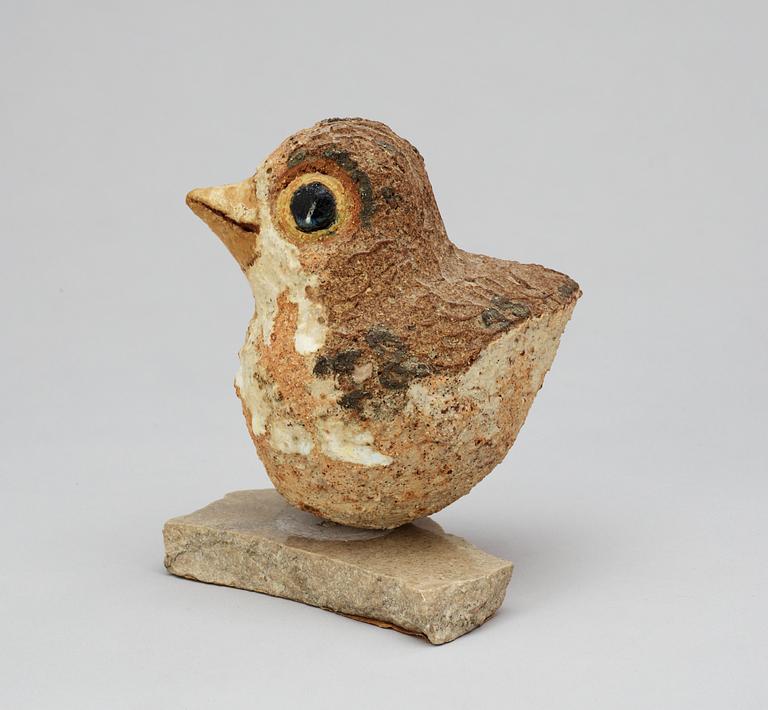 A Tyra Lundgren stoneware figure of a bird.