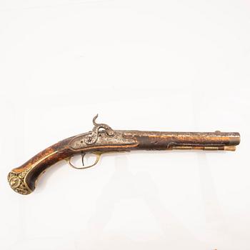 An 18th Century converted percussion pistol.