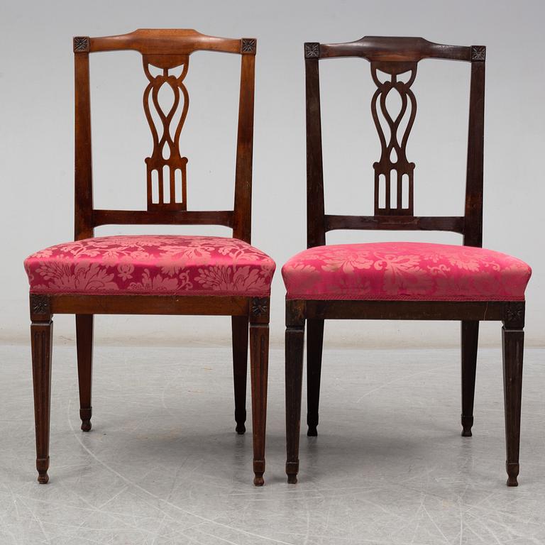 A pair of early 19th century mahogany chairs.