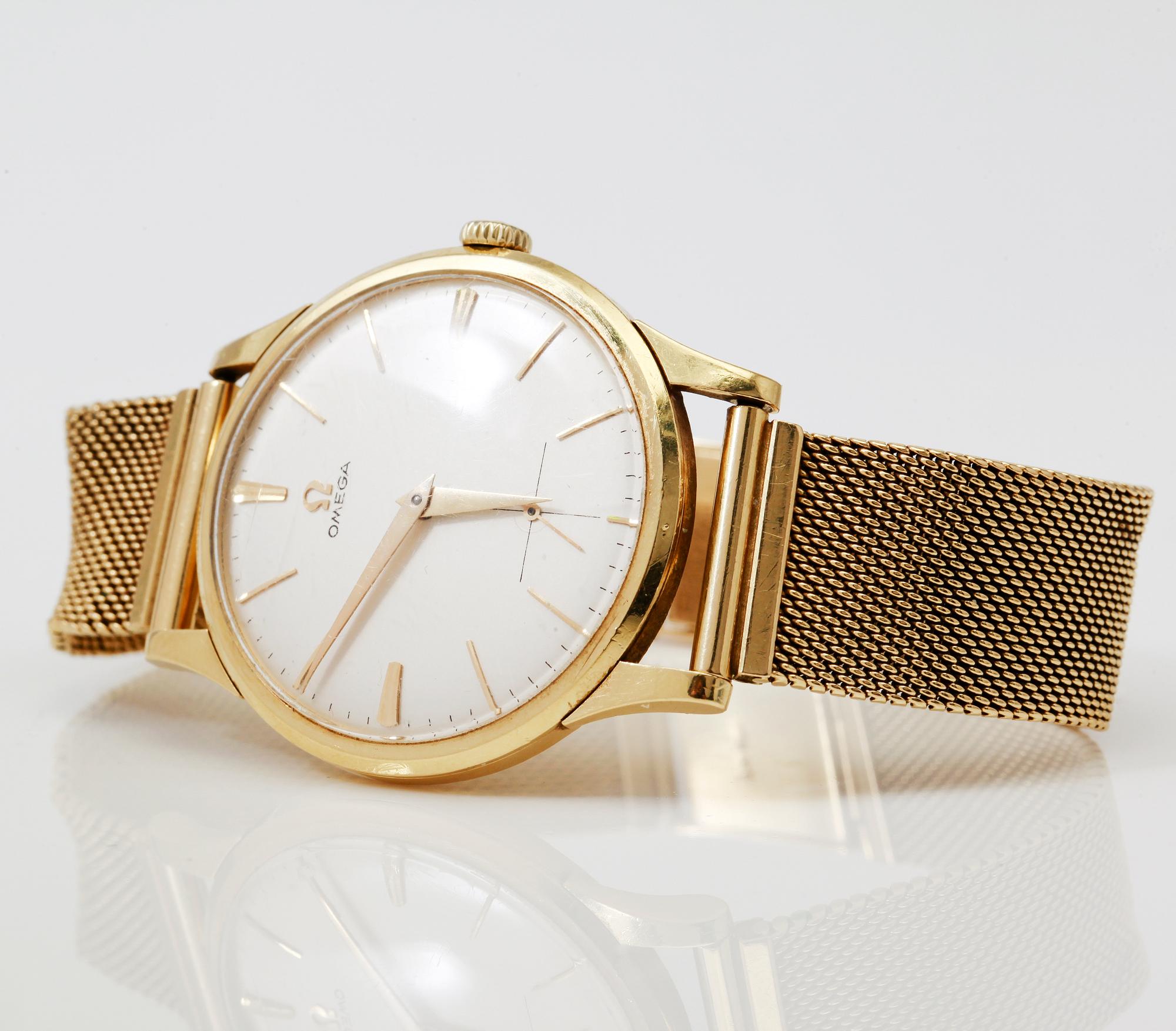 ARMBANDSUR, 18K guld, Omega. Total vikt inklusive urhus ca 65 g.