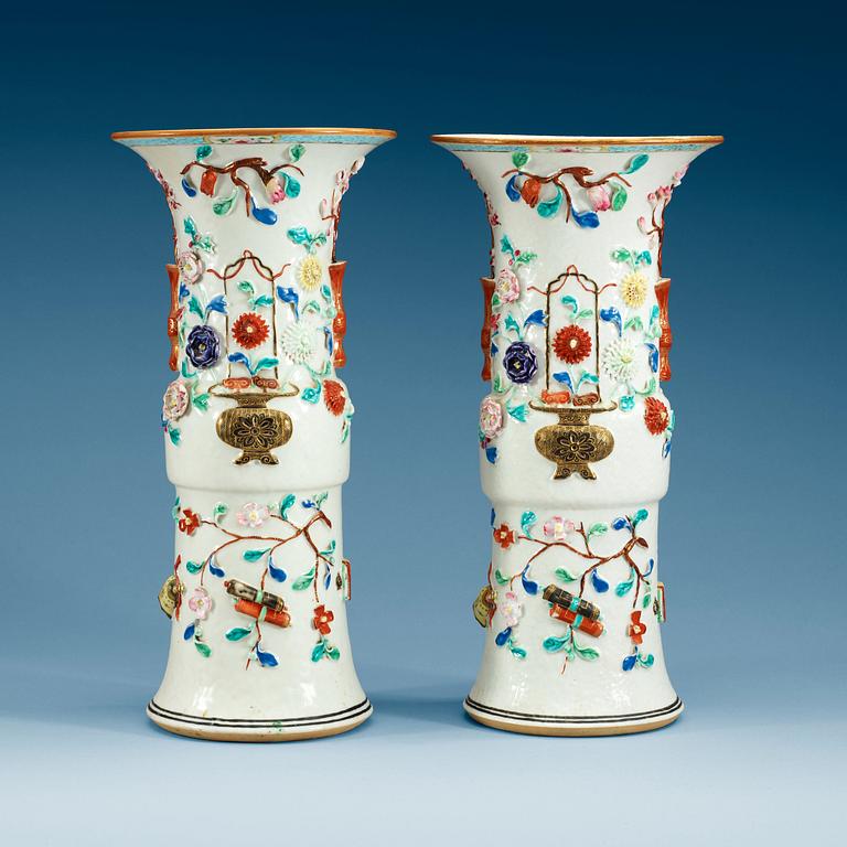 A pair of famille rose vases, Qing dynasty.