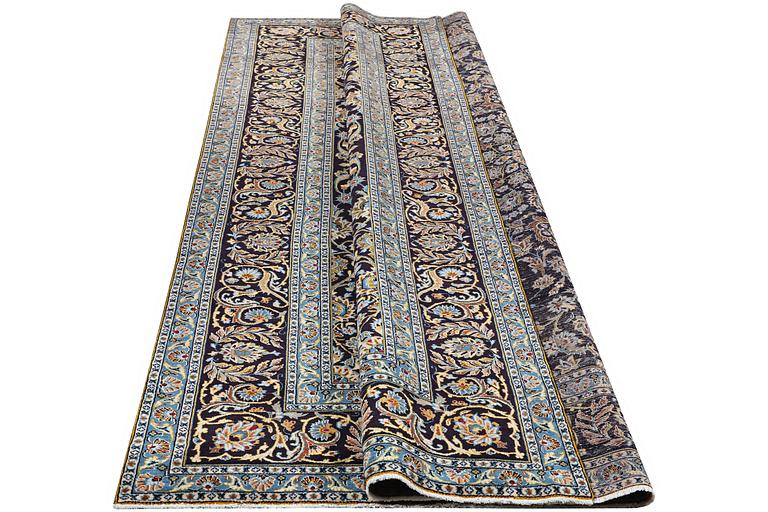 A Keshan carpet, c. 350 x 250 cm.