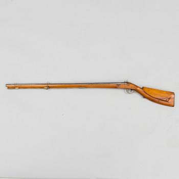 An 18th century percussion gun.