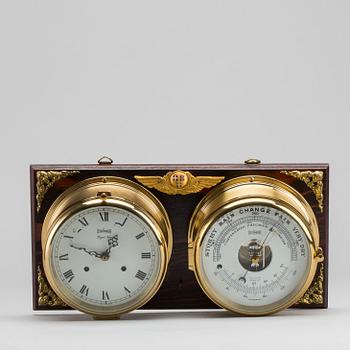 A BRASS MARINE CLOCK AND BAROMETER BY STOCKBURGER.